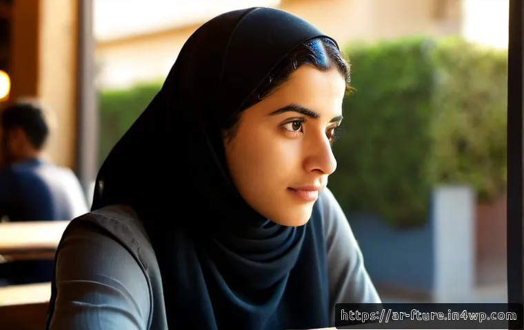 Home 17 대인관계와 불확실성의 심리적 연관성 - Photorealistic Arab young adult seated alone at a tidy café table, looking thoughtfully through a wi...